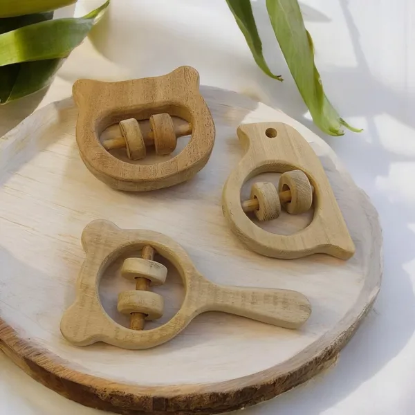 Pack_of_3_Soothing_Sound_Making_Rattles_-_Sparrow,_Hippo_Head_&_Micky_Head_Shapes_-_Made_From_Pure_Neem_Wood