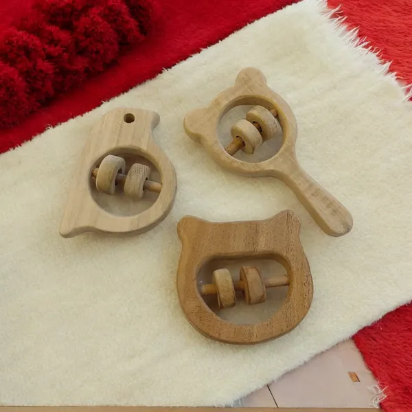 Pack_of_3_Soothing_Sound_Making_Rattles_-_Sparrow,_Hippo_Head_&_Micky_Head_Shapes_-_Made_From_Pure_Neem_Wood