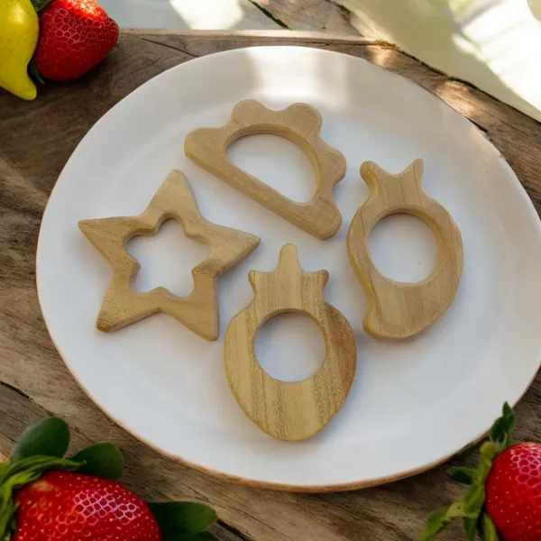 Pack_of_4_Neem_Wooden_Teethers_For_Babies_Of_Age_0_To_3_Years_|Star,_Cloud,_Strawberry_&_Mango