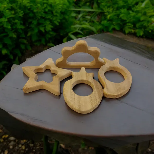 Pack_of_4_Neem_Wooden_Teethers_For_Babies_Of_Age_0_To_3_Years_|Star,_Cloud,_Strawberry_&_Mango