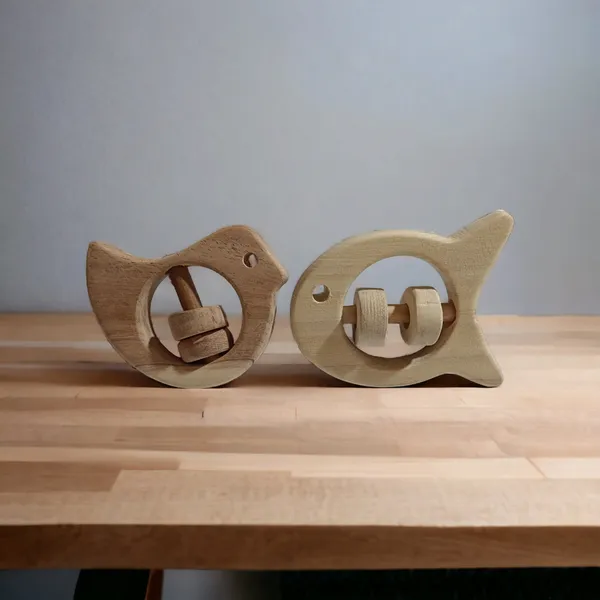 Set_of_2_Chemical_Free_Natural_Neem_Wooden_Rattles_of_Shapes_-Dove_&_Fish