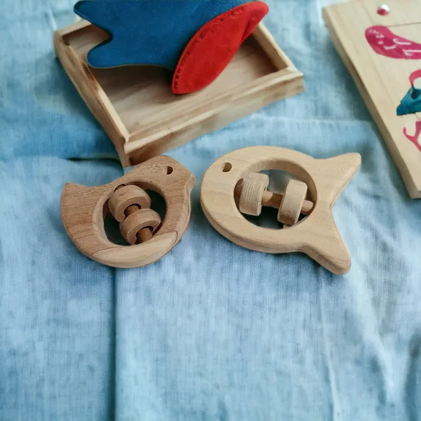 Set_of_2_Chemical_Free_Natural_Neem_Wooden_Rattles_of_Shapes_-Dove_&_Fish