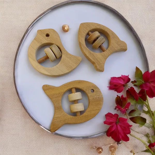 Beautiful_Rattle_Toys_-_Dove,_Fish_&_Rocket_Shapes_-_From_Pure_Neem_Wood