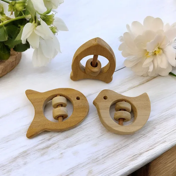 Beautiful_Rattle_Toys_-_Dove,_Fish_&_Rocket_Shapes_-_From_Pure_Neem_Wood