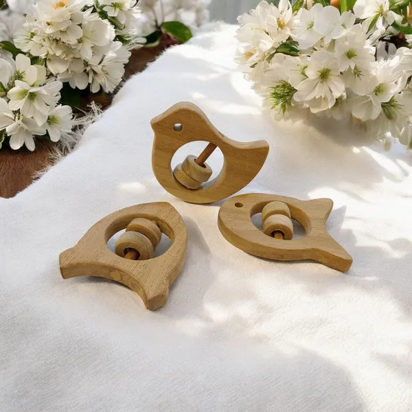 Beautiful_Rattle_Toys_-_Dove,_Fish_&_Rocket_Shapes_-_From_Pure_Neem_Wood