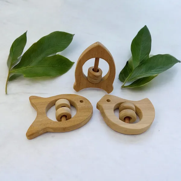 Beautiful_Rattle_Toys_-_Dove,_Fish_&_Rocket_Shapes_-_From_Pure_Neem_Wood