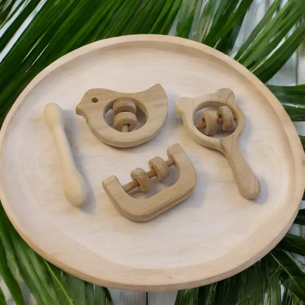 Beautiful_Dove,_Mickey_Head,_C_Shaped_Rattles_&_Dumbbell_Shaped_Teether_made_from_Pure_Neem_Wood