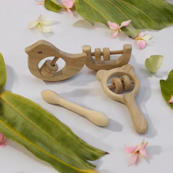 Beautiful_Dove,_Mickey_Head,_C_Shaped_Rattles_&_Dumbbell_Shaped_Teether_made_from_Pure_Neem_Wood