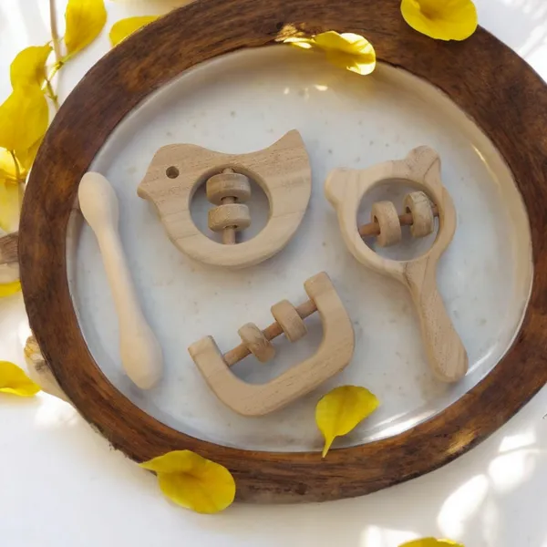 Beautiful_Dove,_Mickey_Head,_C_Shaped_Rattles_&_Dumbbell_Shaped_Teether_made_from_Pure_Neem_Wood