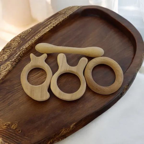 Delicious_Teethers_-_Dumbbell,_Ring,_Bunny_&_Mango_Shapes_-_From_Premium_Neem_Wood