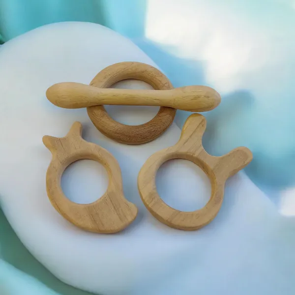 Delicious_Teethers_-_Dumbbell,_Ring,_Bunny_&_Mango_Shapes_-_From_Premium_Neem_Wood