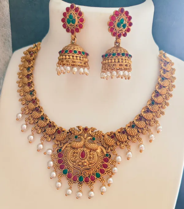 Grisha_Jewellery_Latest_Peacock_Design_White_Pearl_Bead_Brass_Gold_Plated_Matte_Short_Necklace_Jewellery_Set_For_Women_And_Girls