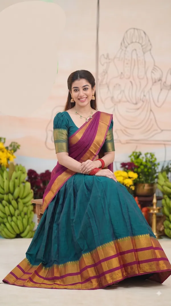 Traditional_Teal_Green_Half_Saree_with_Pink_Dhavani