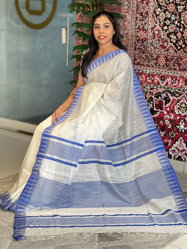 Blue_women's_Bhagalpuri_Kota_Viscous_Temple_Border_White_Saree_And_Variable_Color_Border_With_Blouse_Piece