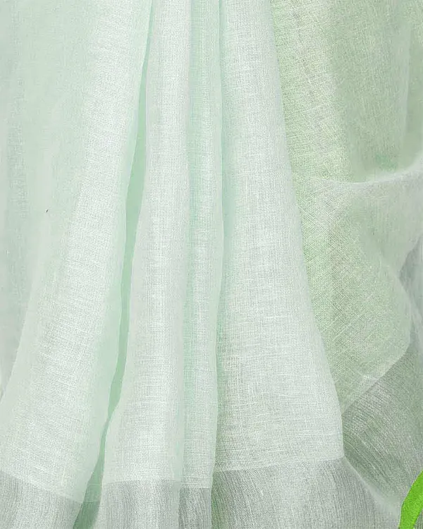 Whte-Green_women's_Bhagalpuri_Handloom_Linen_Cotton_Blend_White_Saree_With_Silver_Zari_Border_And_Contrast_Unstitched_Blouse_Piece