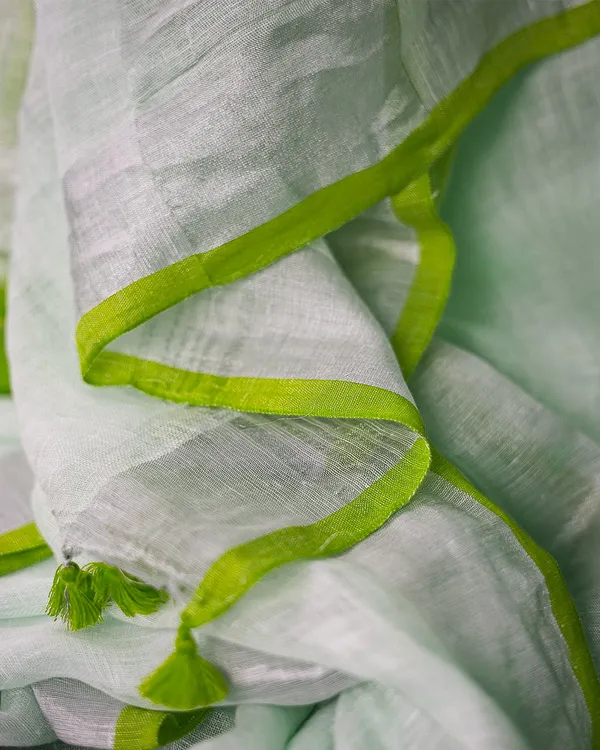 Whte-Green_women's_Bhagalpuri_Handloom_Linen_Cotton_Blend_White_Saree_With_Silver_Zari_Border_And_Contrast_Unstitched_Blouse_Piece