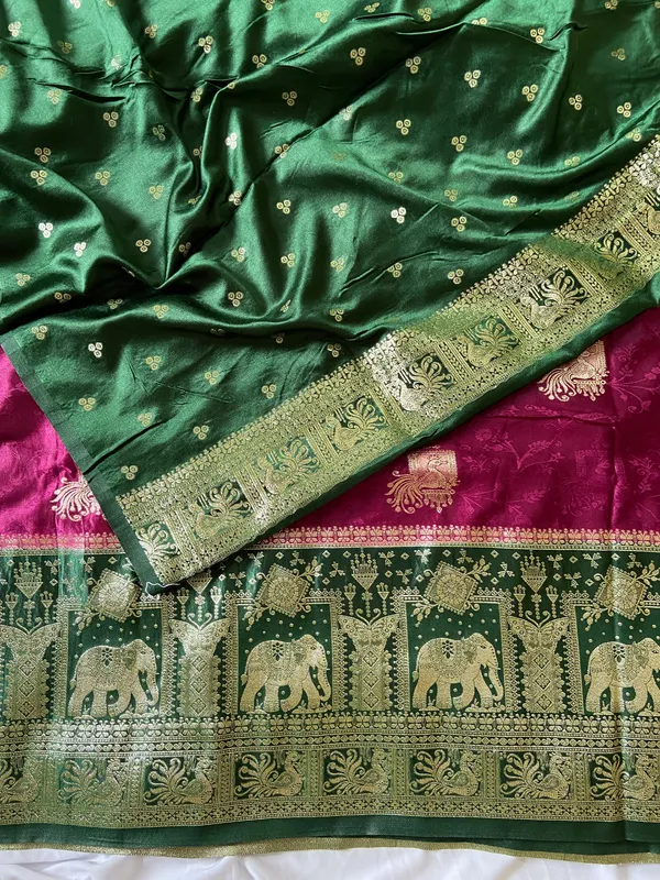Banarasi_Pure_Satin_Silk_sarees_with_Beautiful_Elephant_in_Contrast_Green-Wine_Shades_With_Attractive_Weaving_Gold_Zari_Design_And_Contrast_Blouse_With_Tassels