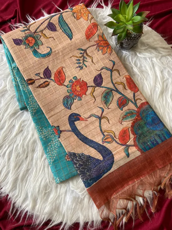 Soft_Tussar_Silk_sarees_with_Beautiful_Style_Of_Kalamkari_Digital_Print_With_Attractive_Border_And_Contrast_Print_Blouse_With_Tassels