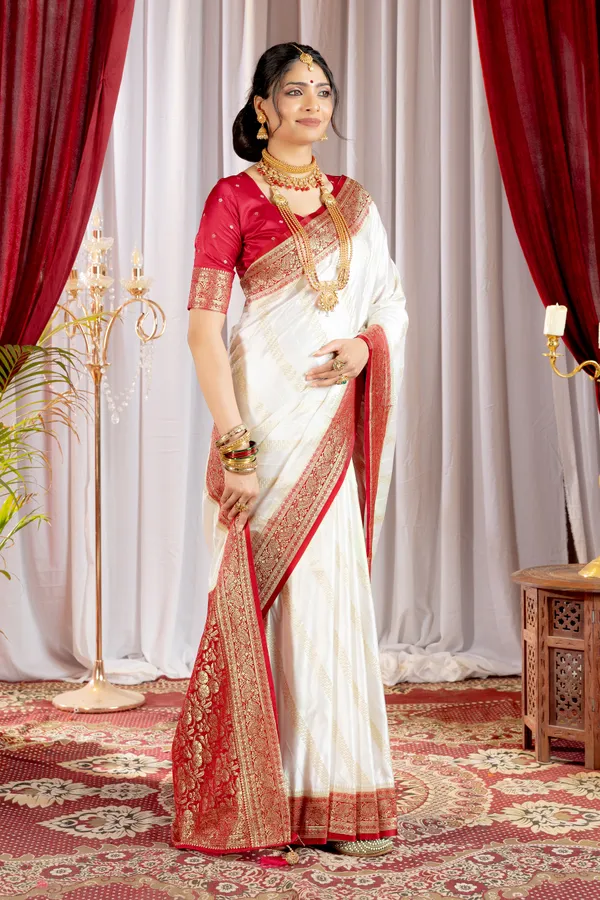 Banarasi_Pure_Satin_Silk_sarees_with_Beautiful_Elephant_in_Contrast_Red-White_Shades_With_Attractive_Weaving_Gold_Zari_Design_And_Contrast_Blouse_With_Tassels