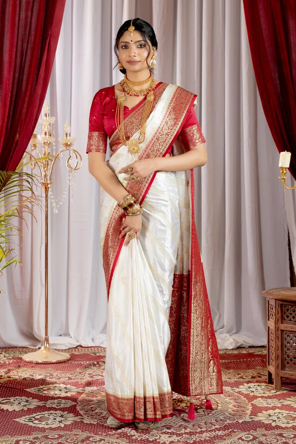 Banarasi_Pure_Satin_Silk_sarees_with_Beautiful_Elephant_in_Contrast_Red-White_Shades_With_Attractive_Weaving_Gold_Zari_Design_And_Contrast_Blouse_With_Tassels