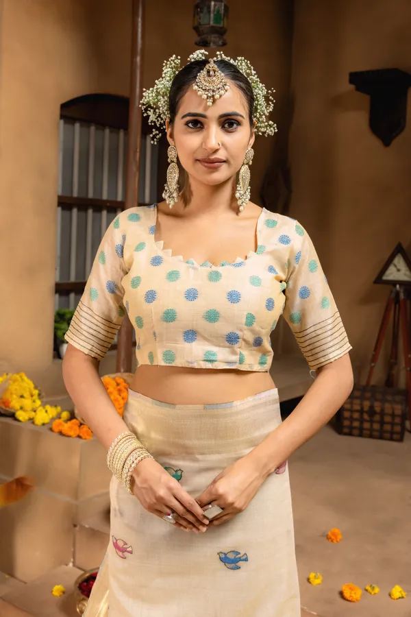 Premium_Soft_Muga_Cotton_sarees_with_Beautiful_Colourfull_Resham_Weaving_Pallu_With_Attractive_Traditional_Zari_Weaving_Border_With_All_Over_Resham_Weaving_Birds_Design_And_Resham_Weaving_Butti_Blouse_With_Fancy_Tassels