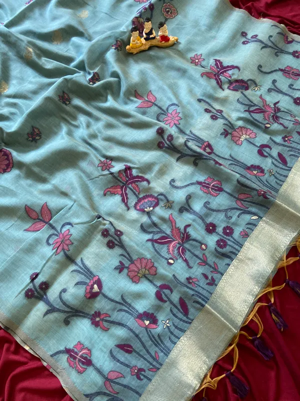 Premium_Soft_Muga_Cotton_sarees_with_Beautiful_Colourfull_Resham_Weaving__Flower_Design_Pallu_With_Attractive_Traditional_Zari_Weaving__With_All_Over__Resham_Weaving__And_Resham_Weaving_Butti_Blouse_With_Fancy_Tassels