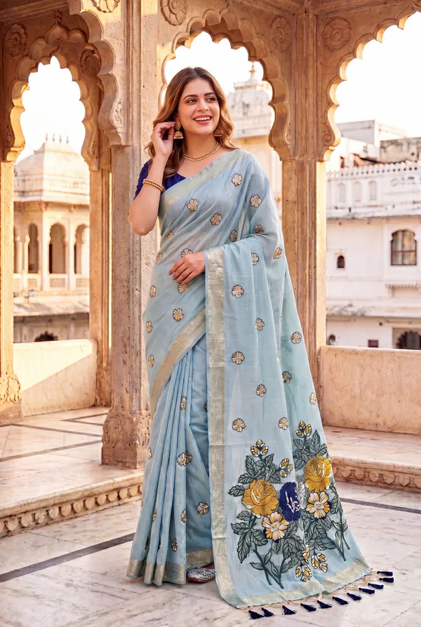 Premium_Soft_Muga_Cotton_sarees_with_Beautiful_Colourfull_Resham_Weaving_Flower_Design_Pallu_With_Attractive_All_Over_Resham_Weaving__Flower_Design_With_Zari_Weaving_Border_And_Contrast_Blouse_With_Fancy_Tassels