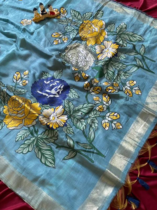 Premium_Soft_Muga_Cotton_sarees_with_Beautiful_Colourfull_Resham_Weaving_Flower_Design_Pallu_With_Attractive_All_Over_Resham_Weaving__Flower_Design_With_Zari_Weaving_Border_And_Contrast_Blouse_With_Fancy_Tassels