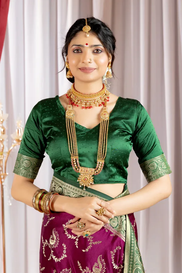 Banarasi_Pure_Satin_Silk_sarees_with_Beautiful_Peacock_in_Contrast_Green-Wine_Shades_With_Attractive_Weaving_Gold_Zari_Design_And_Contrast_Blouse_With_Tassels