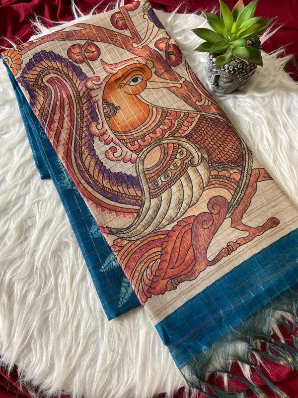Soft_Tussar_Silk_sarees_with_Beautiful_Style_Of_Kalamkari_Digital_Print_With_Attractive_Border_And_Contrast_Print_Blouse_With_Tassels