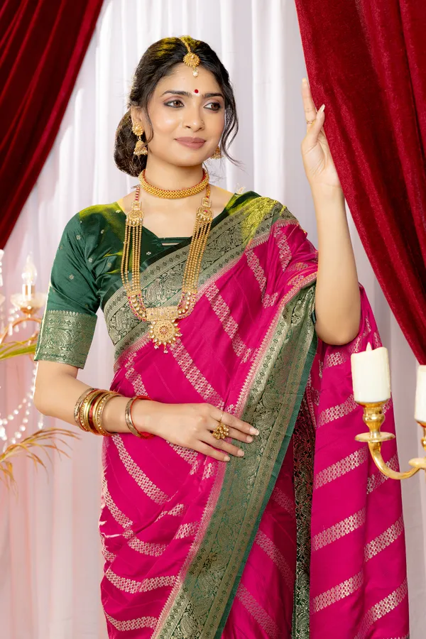 Banarasi_Pure_Satin_Silk_sarees_with_Beautiful_Elephant_in_Contrast_Green-Rani_Shades_With_Attractive_Weaving_Gold_Zari_Design_And_Contrast_Blouse_With_Tassels