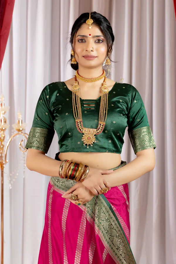 Banarasi_Pure_Satin_Silk_sarees_with_Beautiful_Elephant_in_Contrast_Green-Rani_Shades_With_Attractive_Weaving_Gold_Zari_Design_And_Contrast_Blouse_With_Tassels
