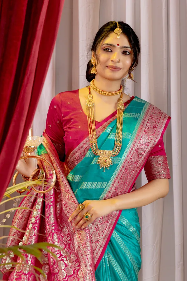 Banarasi_Pure_Satin_Silk_sarees_with_Beautiful_Elephant_in_Contrast_Pink-Rama_Shades_With_Attractive_Weaving_Gold_Zari_Design_And_Contrast_Blouse_With_Tassels