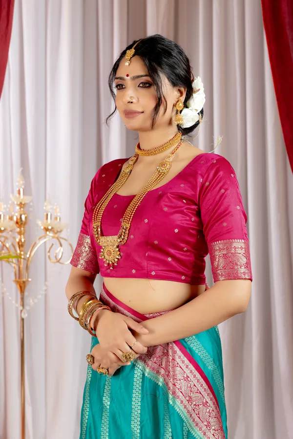 Banarasi_Pure_Satin_Silk_sarees_with_Beautiful_Elephant_in_Contrast_Pink-Rama_Shades_With_Attractive_Weaving_Gold_Zari_Design_And_Contrast_Blouse_With_Tassels