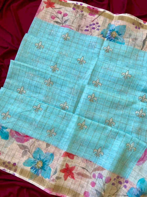 Soft_Premium_Linen_sarees_with_Beautiful_Print_With_Attractive_Checks_Design_Saree_With_Gold_Zari_Border_And_Print_Blouse_With_Tassels