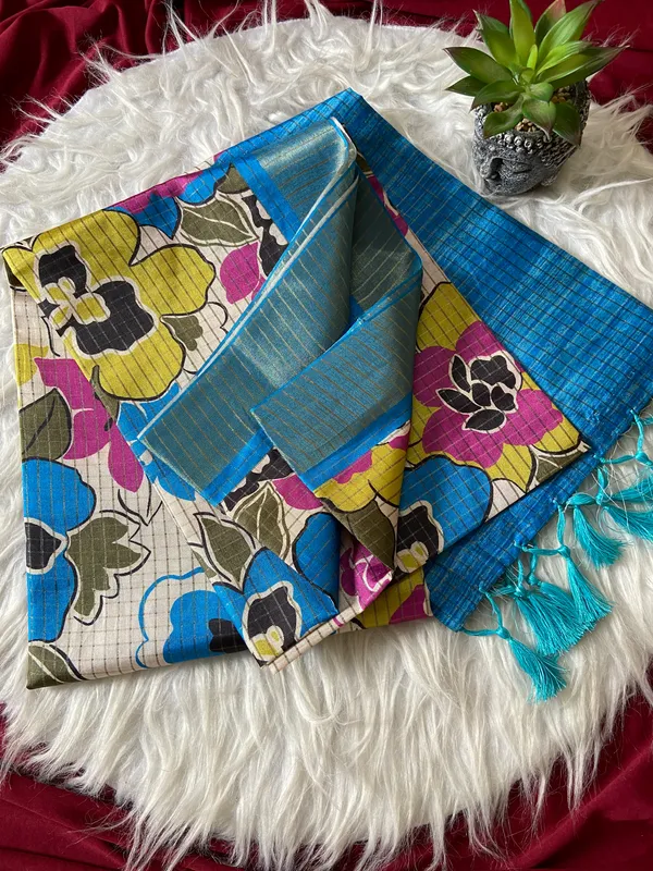 Soft_Tussar_Silk_sarees_with_Beautiful_Style_Of_Floral_Digital_Print_With_Attractive_Border_And_Contrast_Print_Blouse_With_Tassels