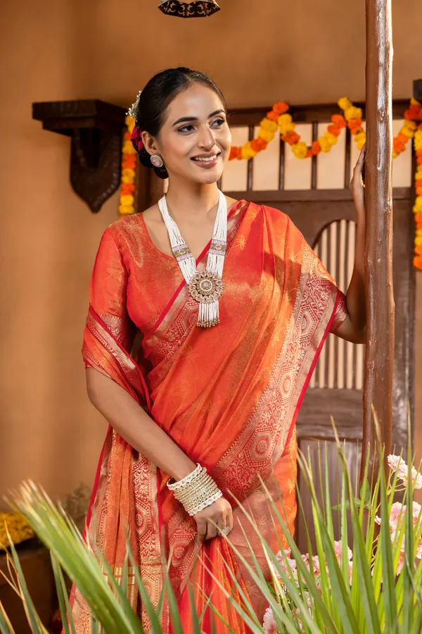 Premium_Soft_Fandy_Satin_sarees_with_Beautiful_Self_Design_Weaving__Pallu_With_Attractive_Traditional_Zari_Weaving__Border_With_All_Over_Self_Weaving__Design_And_Self_Design_Weaving__Blouse_With_Fancy_Tassels