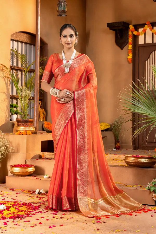 Premium_Soft_Fandy_Satin_sarees_with_Beautiful_Self_Design_Weaving__Pallu_With_Attractive_Traditional_Zari_Weaving__Border_With_All_Over_Self_Weaving__Design_And_Self_Design_Weaving__Blouse_With_Fancy_Tassels