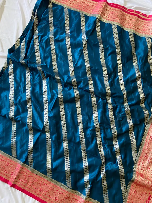 Banarasi_Pure_Satin_Silk_sarees_with_Beautiful_Elephant_in_Contrast_Pink-Blue_Shades_With_Attractive_Weaving_Gold_Zari_Design_And_Contrast_Blouse_With_Tassels