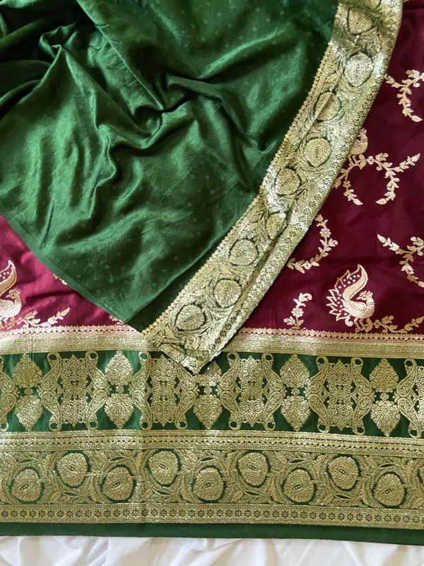 Banarasi_Pure_Satin_Silk_sarees_with_Beautiful_Peacock_in_Contrast_Green-Wine_Shades_With_Attractive_Weaving_Gold_Zari_Design_And_Contrast_Blouse_With_Tassels
