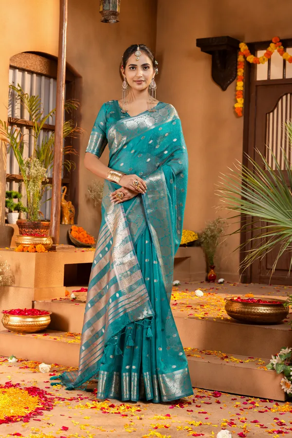 Premium_Soft_Khadi_Shimmer_sarees_with_Beautiful_Butti_Design_Weaving__Pallu_With_Attractive_Traditional_Zari_Weaving__Border_With_All_Over_Butti_Weaving__Design_And_Butti_Design_Weaving__Blouse_With_Fancy_Tassels