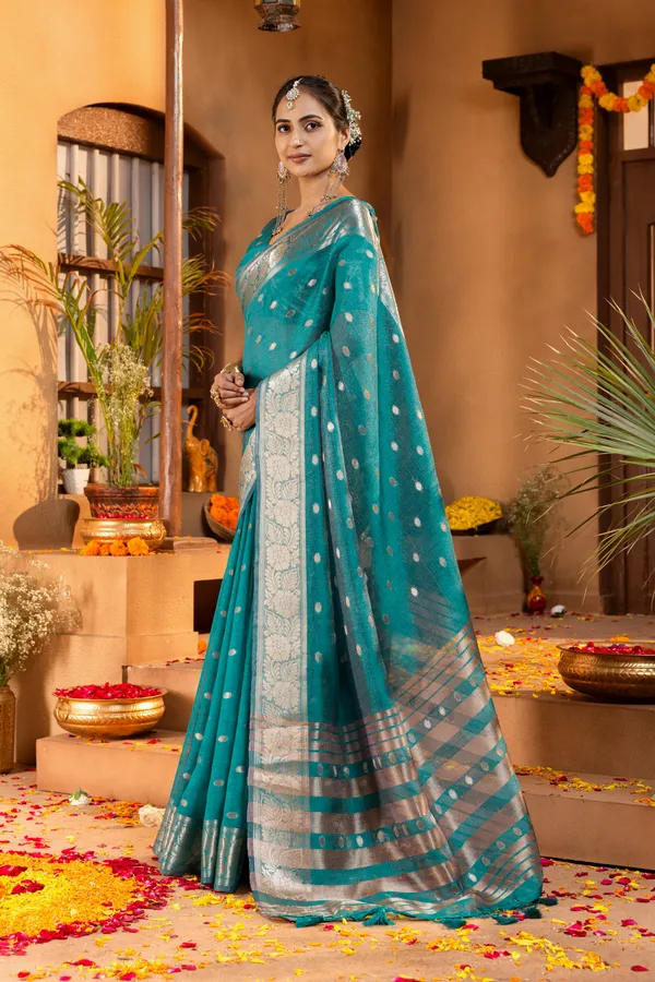 Premium_Soft_Khadi_Shimmer_sarees_with_Beautiful_Butti_Design_Weaving__Pallu_With_Attractive_Traditional_Zari_Weaving__Border_With_All_Over_Butti_Weaving__Design_And_Butti_Design_Weaving__Blouse_With_Fancy_Tassels