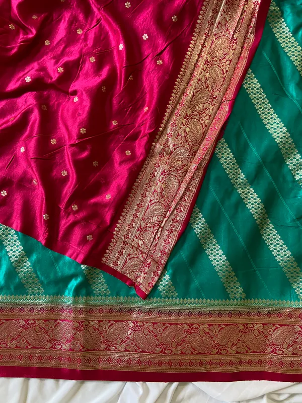 Banarasi_Pure_Satin_Silk_sarees_with_Beautiful_Elephant_in_Contrast_Pink-Rama_Shades_With_Attractive_Weaving_Gold_Zari_Design_And_Contrast_Blouse_With_Tassels