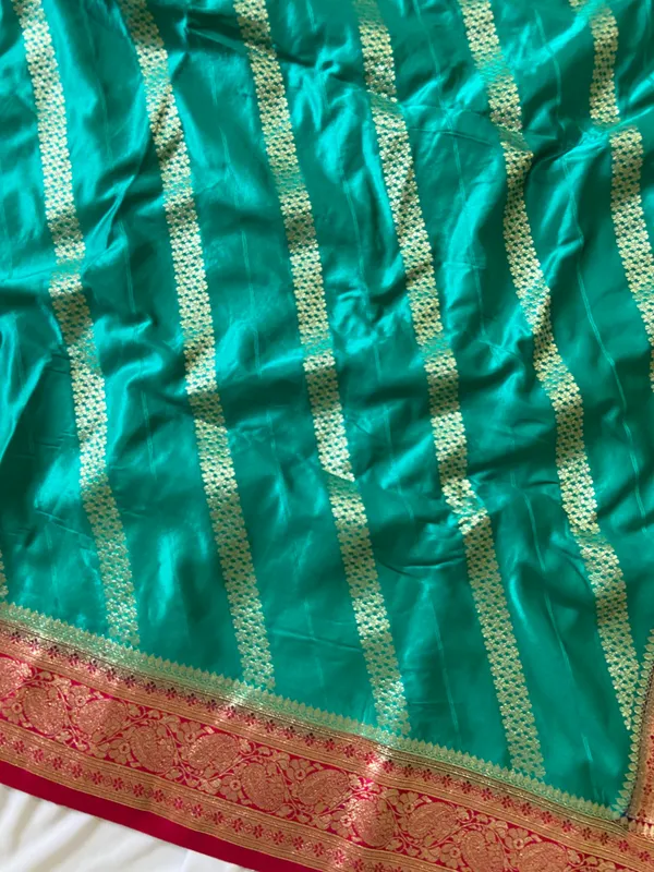 Banarasi_Pure_Satin_Silk_sarees_with_Beautiful_Elephant_in_Contrast_Pink-Rama_Shades_With_Attractive_Weaving_Gold_Zari_Design_And_Contrast_Blouse_With_Tassels