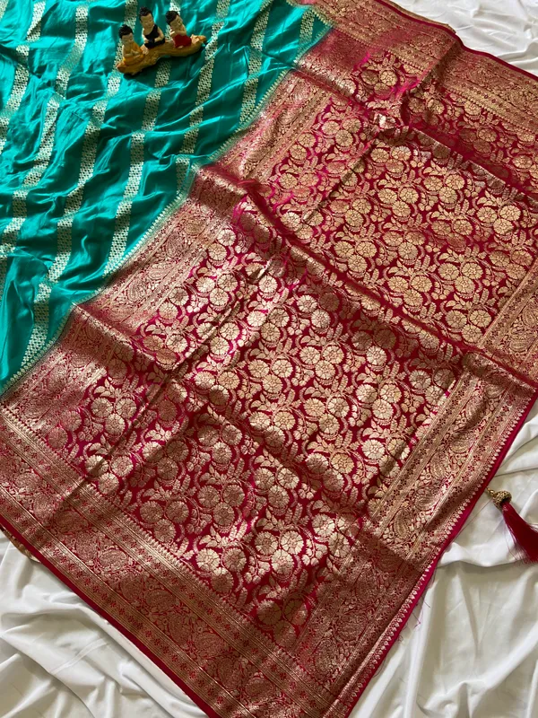 Banarasi_Pure_Satin_Silk_sarees_with_Beautiful_Elephant_in_Contrast_Pink-Rama_Shades_With_Attractive_Weaving_Gold_Zari_Design_And_Contrast_Blouse_With_Tassels