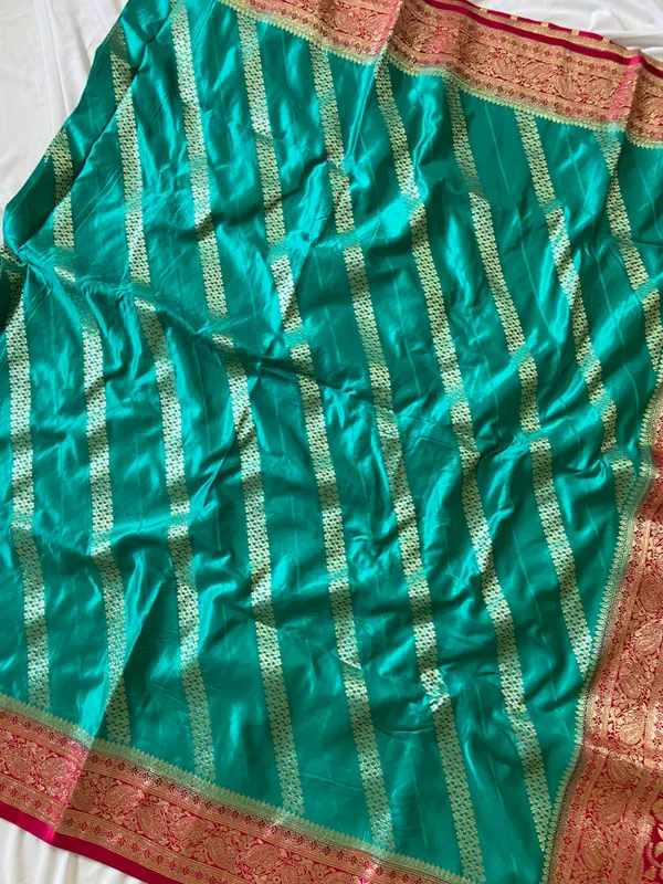 Banarasi_Pure_Satin_Silk_sarees_with_Beautiful_Elephant_in_Contrast_Pink-Rama_Shades_With_Attractive_Weaving_Gold_Zari_Design_And_Contrast_Blouse_With_Tassels