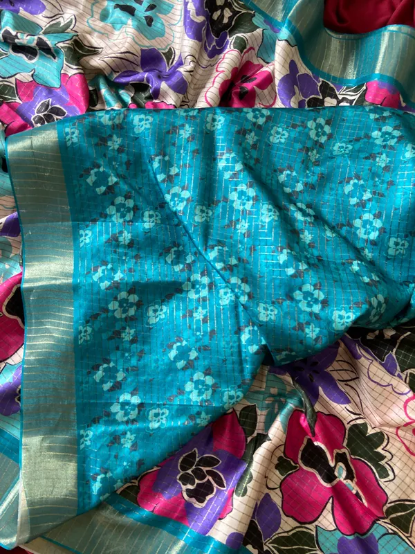 Soft_Tussar_Silk_sarees_with_Beautiful_Style_Of_Floral_Digital_Print_With_Attractive_Border_And_Contrast_Print_Blouse_With_Tassels