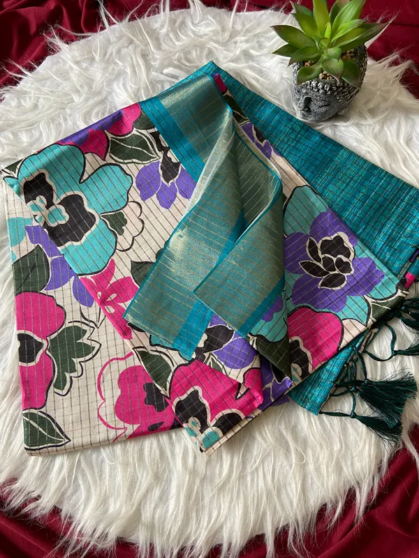 Soft_Tussar_Silk_sarees_with_Beautiful_Style_Of_Floral_Digital_Print_With_Attractive_Border_And_Contrast_Print_Blouse_With_Tassels
