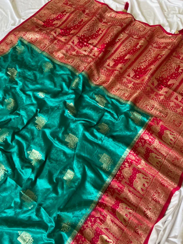 Banarasi_Pure_Satin_Silk_sarees_with_Beautiful_Elephant_in_Contrast_Pink-Rama_Shades_With_Attractive_Weaving_Gold_Zari_Design_And_Contrast_Blouse_With_Tassels