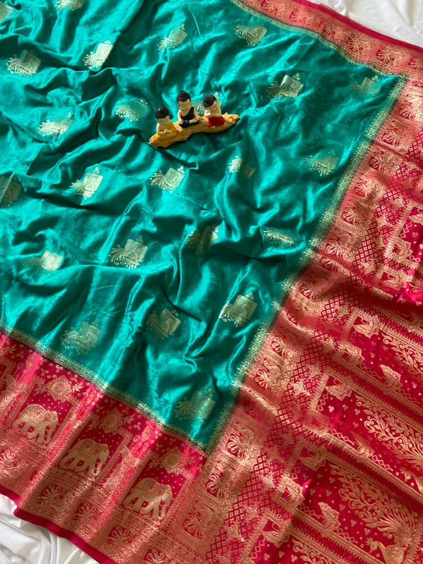 Banarasi_Pure_Satin_Silk_sarees_with_Beautiful_Elephant_in_Contrast_Pink-Rama_Shades_With_Attractive_Weaving_Gold_Zari_Design_And_Contrast_Blouse_With_Tassels